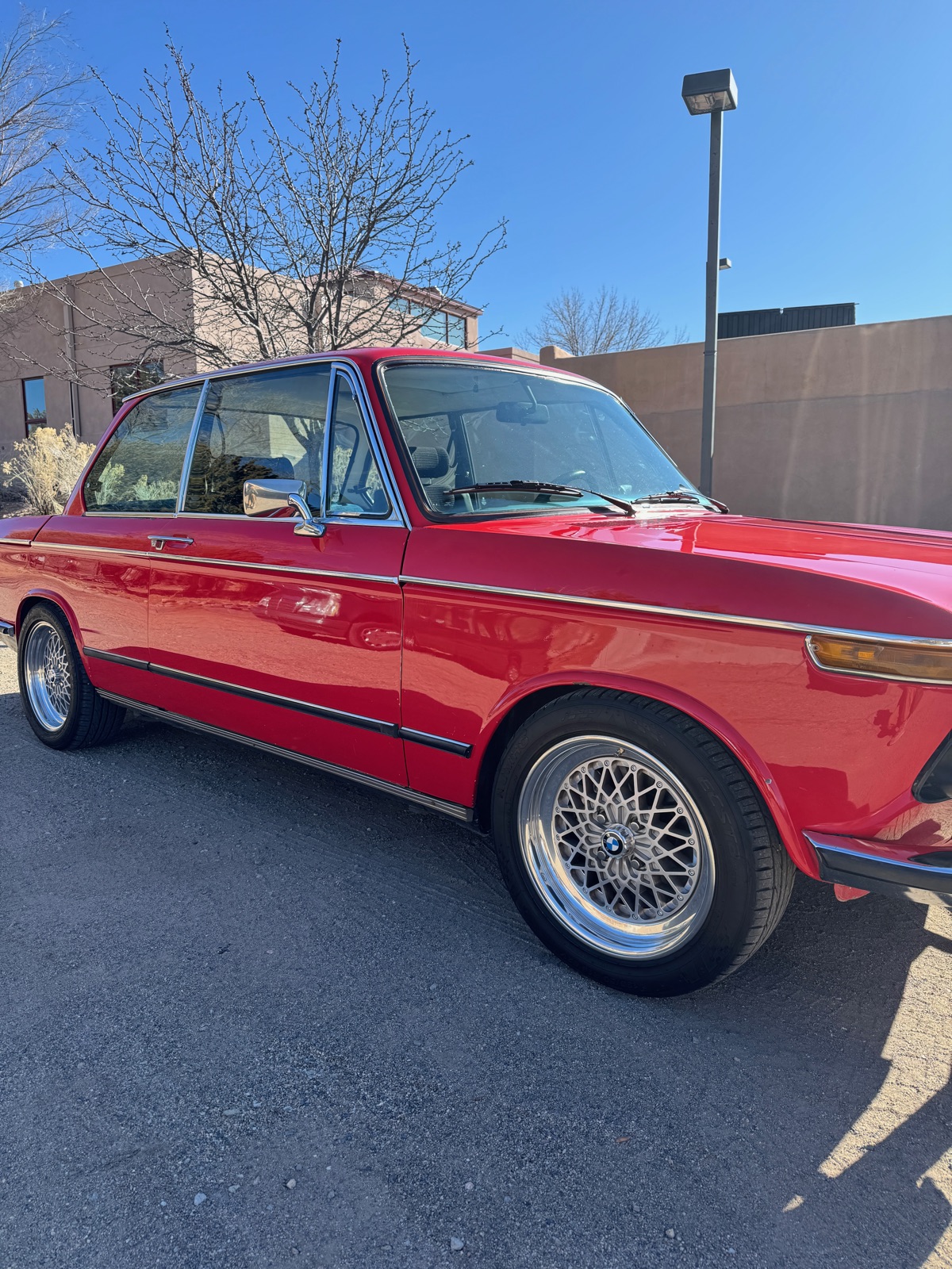 BMW 2002 driver side detail — BBS wheels, chrome trim