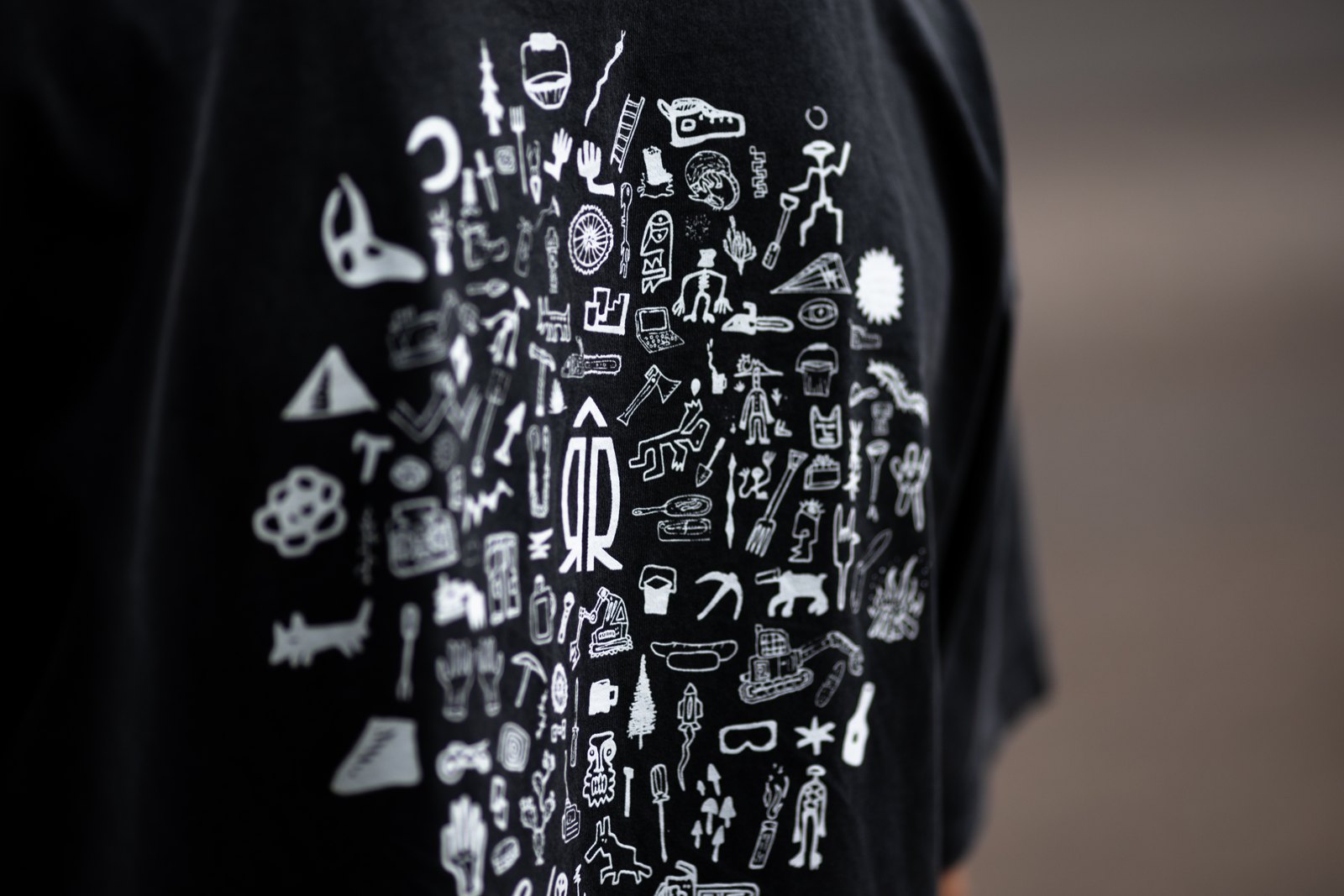 Round-two tee, black colorway, print detail