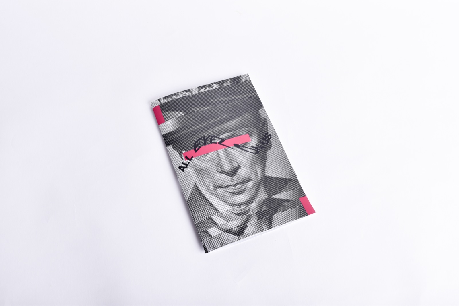 All Eyes On Us — printed zine flat lay, halftone cover with hot pink bars