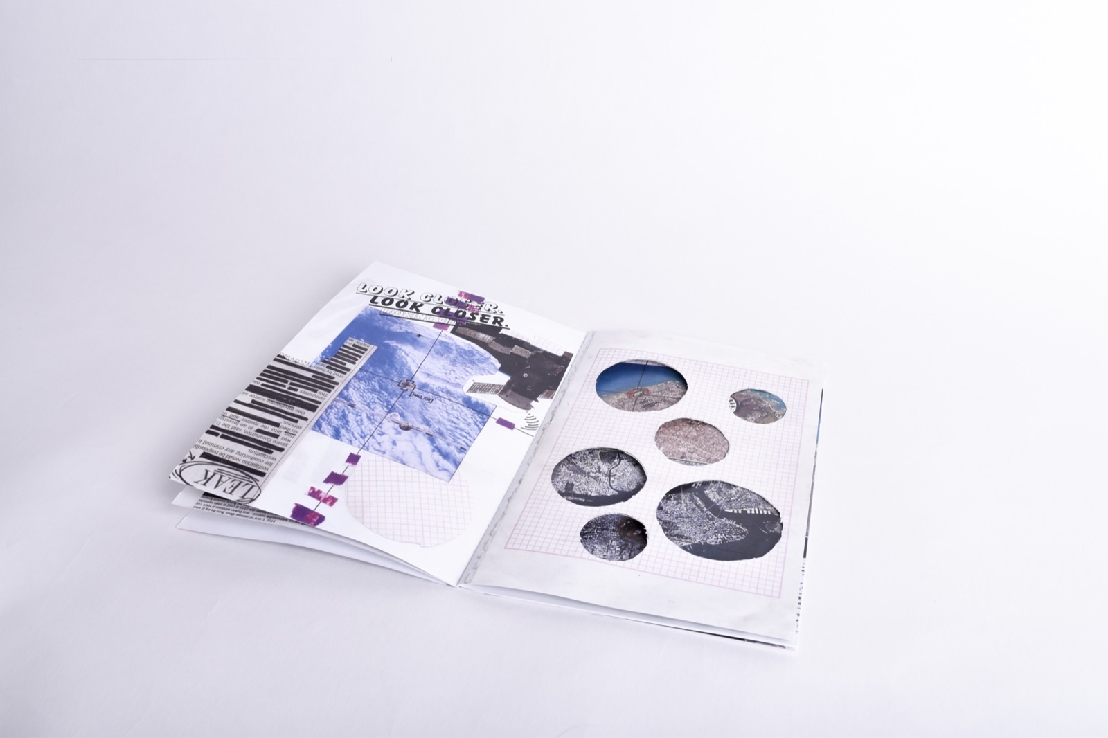 All Eyes On Us — open spread showing ISS collage and die-cut circle pages